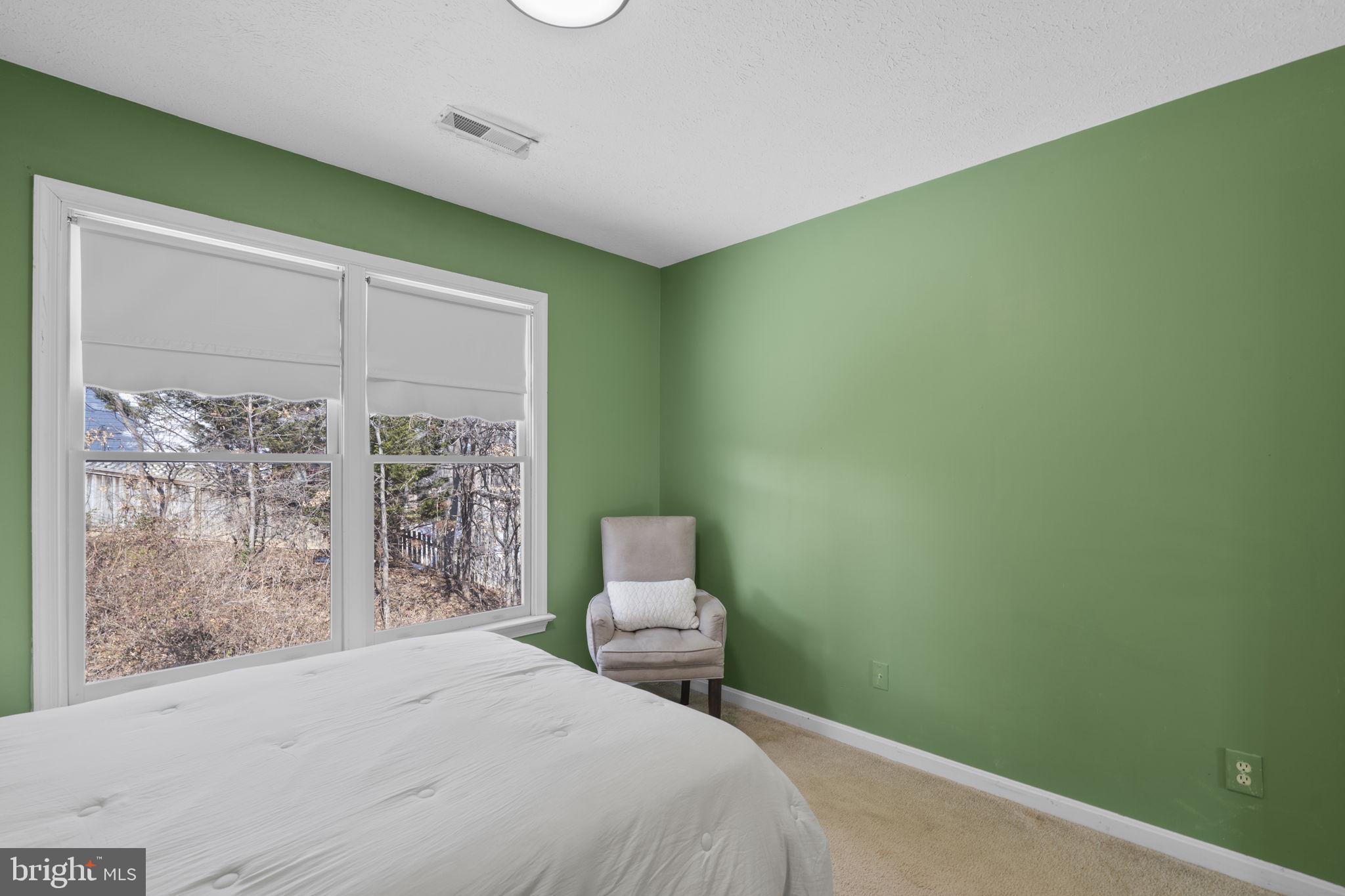 42 Lawhorn Road Stafford, VA 22554 - Photo 36 of 46 a bedroom with a bed and a window