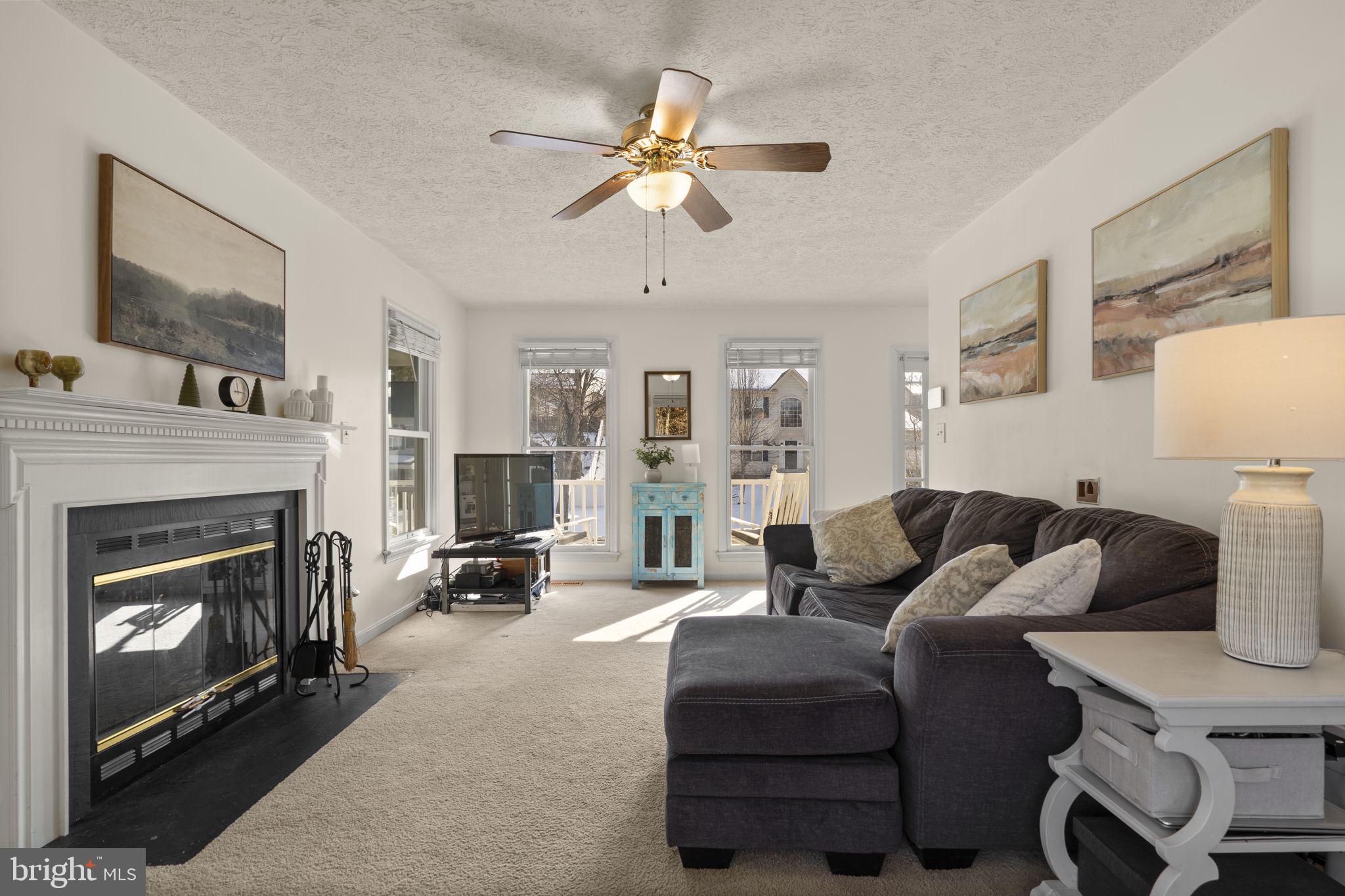 42 Lawhorn Road Stafford, VA 22554 - Photo 7 of 46 a living room with furniture and a fireplace