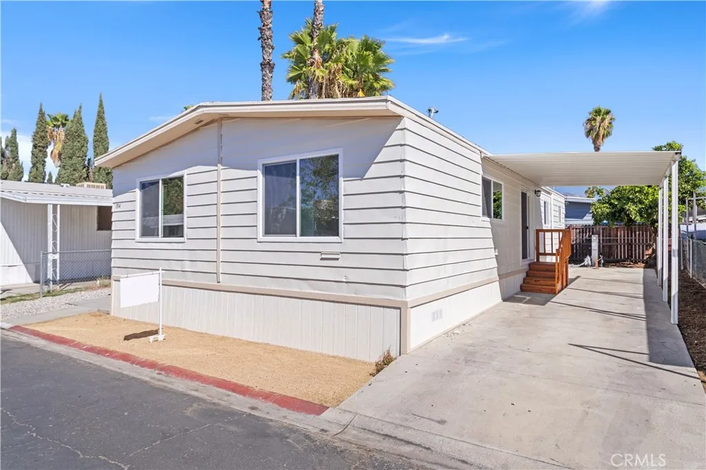 a view of a house with a street