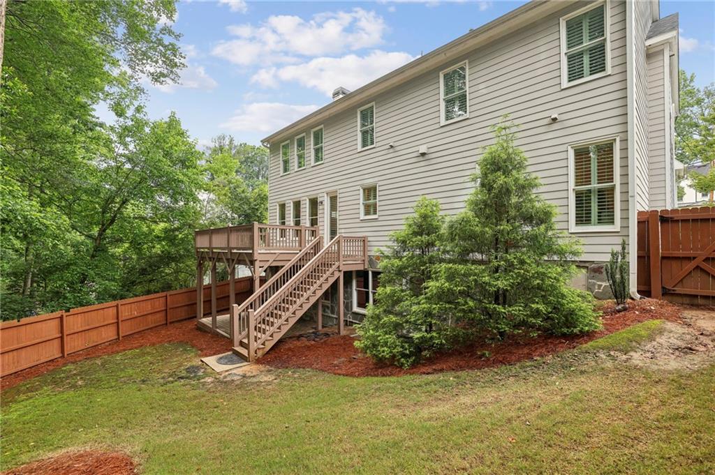 2585 Drew Valley Road Northeast Brookhaven, GA 30319 - Photo 12 of 44 a view of a house with a backyard