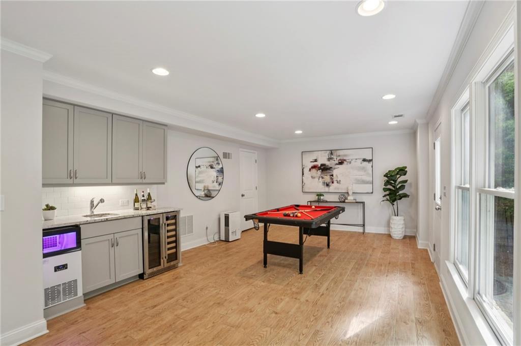 2585 Drew Valley Road Northeast Brookhaven, GA 30319 - Photo 19 of 44 a view of a kitchen with a table and a chair