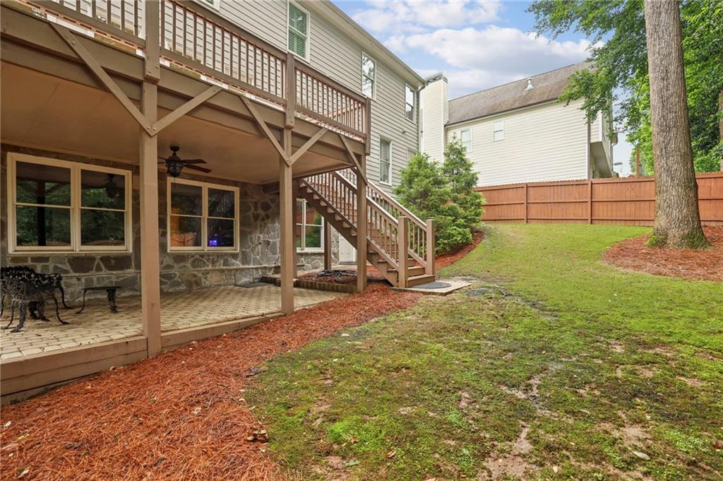 2585 Drew Valley Road Northeast Brookhaven, GA 30319 - Photo 22 of 44 a view of a house with backyard and sitting area