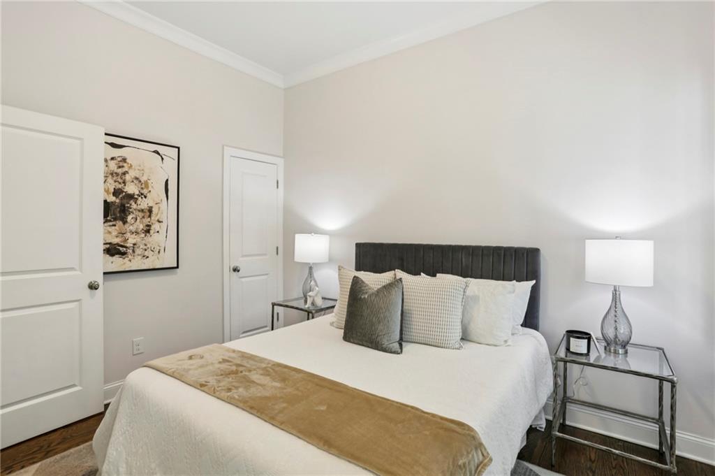 2585 Drew Valley Road Northeast Brookhaven, GA 30319 - Photo 25 of 44 a bedroom with a bed and lamp