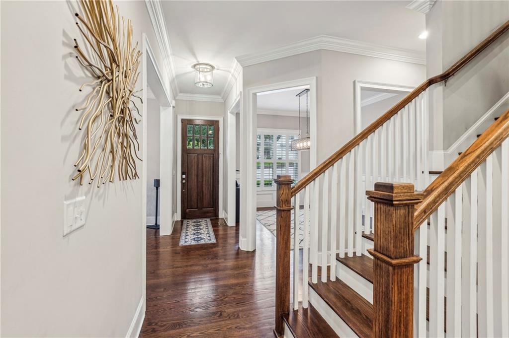 2585 Drew Valley Road Northeast Brookhaven, GA 30319 - Photo 26 of 44 a view of an entryway with wooden floor and staircase