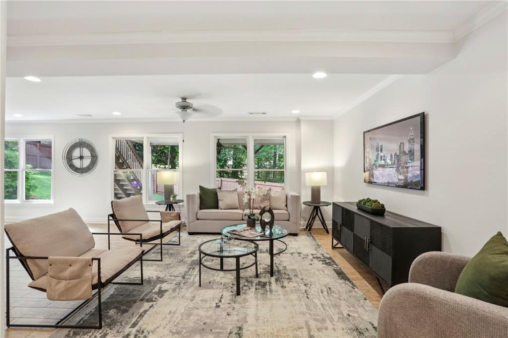 2585 Drew Valley Road Northeast Brookhaven, GA 30319 - Photo 36 of 44 a living room with furniture and a large window
