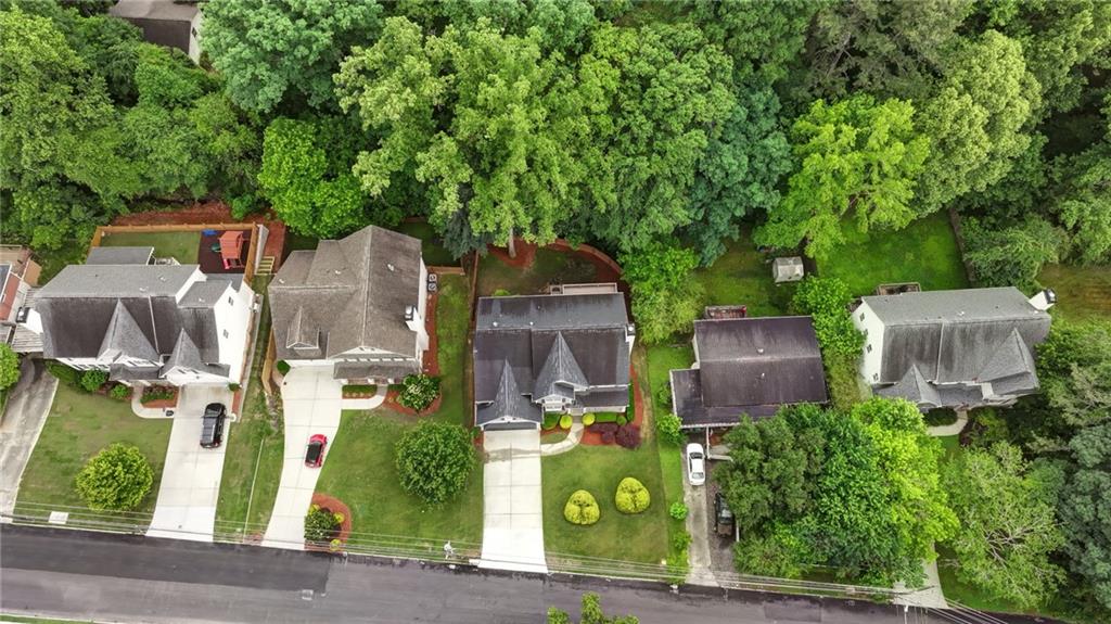 2585 Drew Valley Road Northeast Brookhaven, GA 30319 - Photo 44 of 44 an aerial view of a house with garden space and street view
