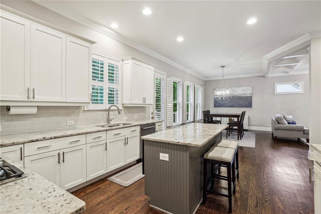 2585 Drew Valley Road Northeast Brookhaven, GA 30319 - Photo 10 of 44 a kitchen with sink cabinets and wooden floor