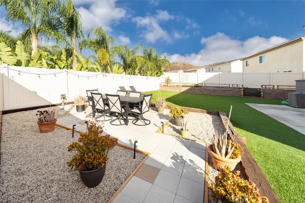 32078 Rambling Court Winchester, CA 92596 - Photo 42 of 48 a view of swimming pool with outdoor seating and plants
