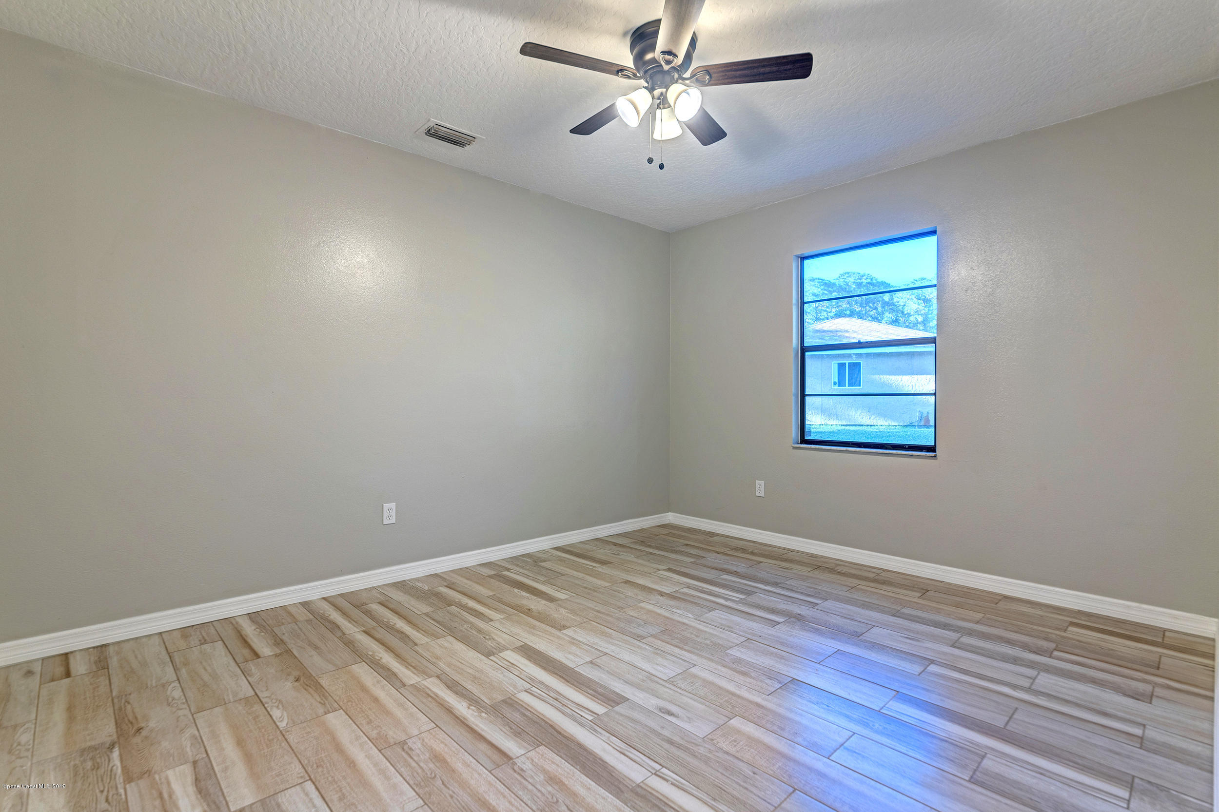 855 Fletcher Road Southeast Palm Bay, FL 32909 - Photo 14 of 24 855-fletcher-rd-6-2500