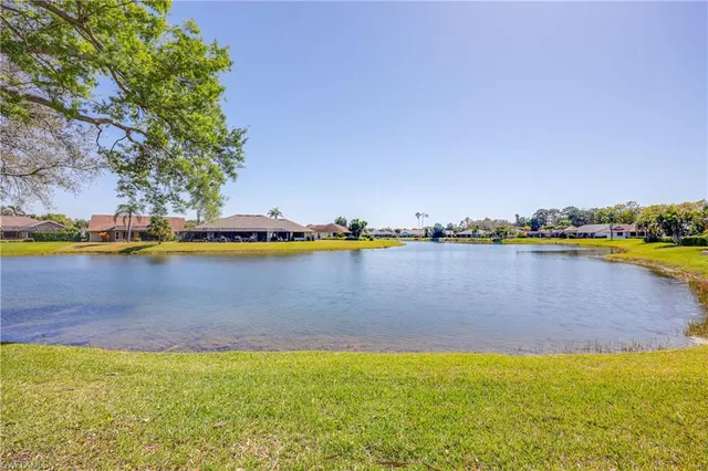 a view of a swimming pool and an outdoor space