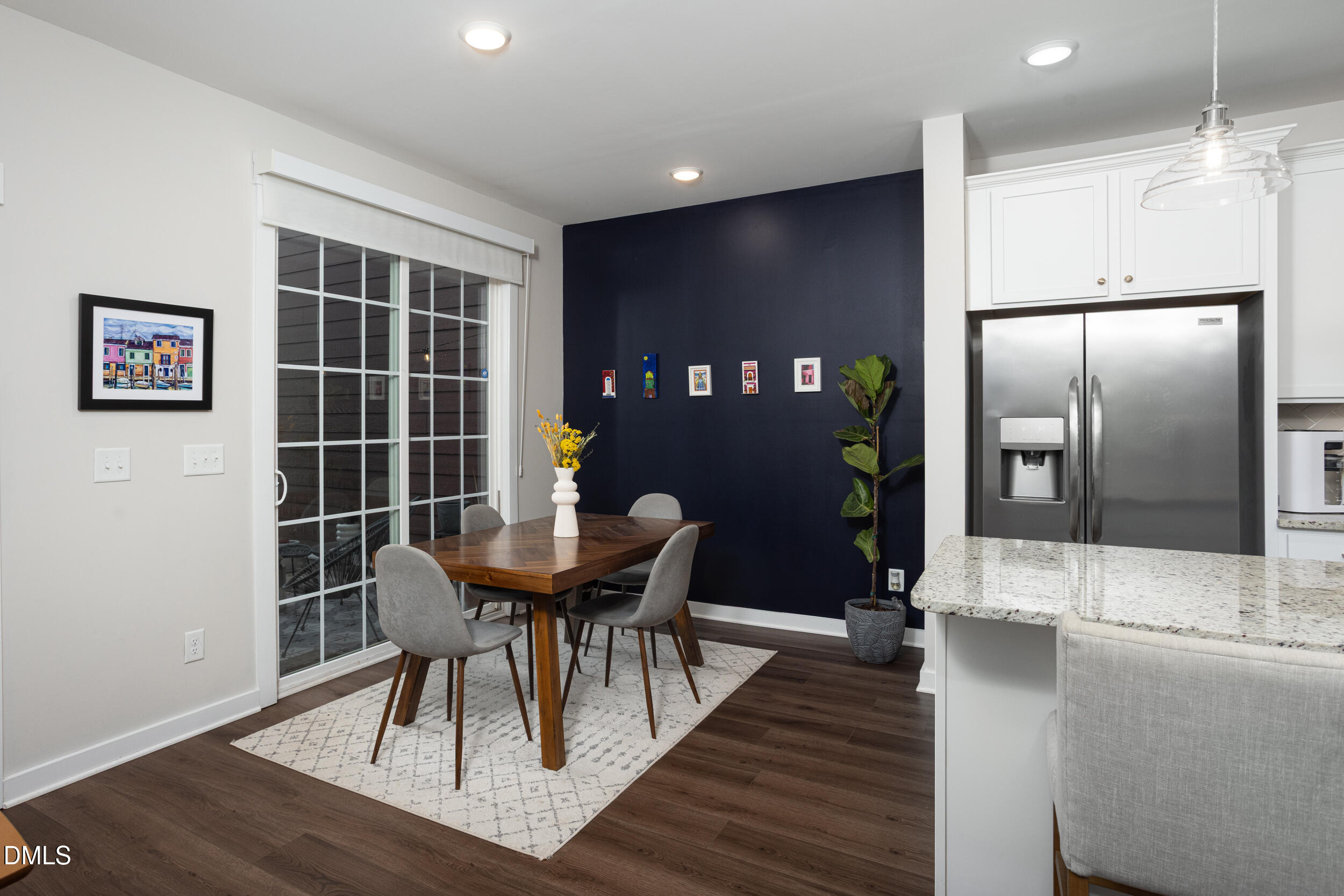 469 Rally Point Place Wake Forest, NC 27587 - Photo 12 of 37 a view of a dining room with furniture and wooden floor