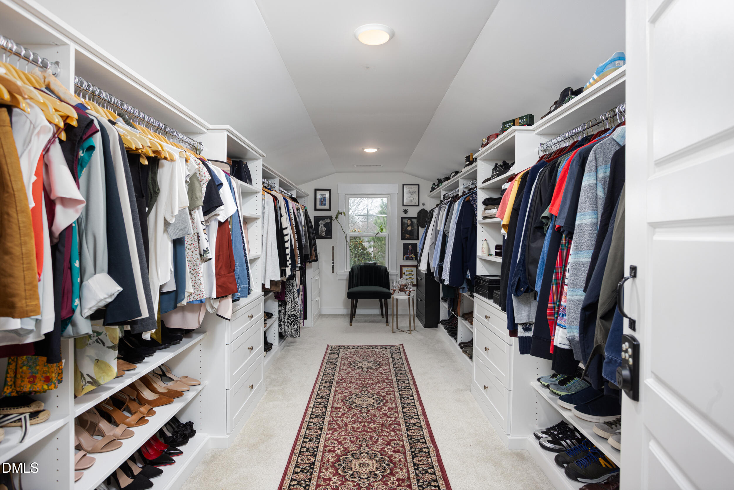 469 Rally Point Place Wake Forest, NC 27587 - Photo 21 of 37 a view of walk in closet with clothes