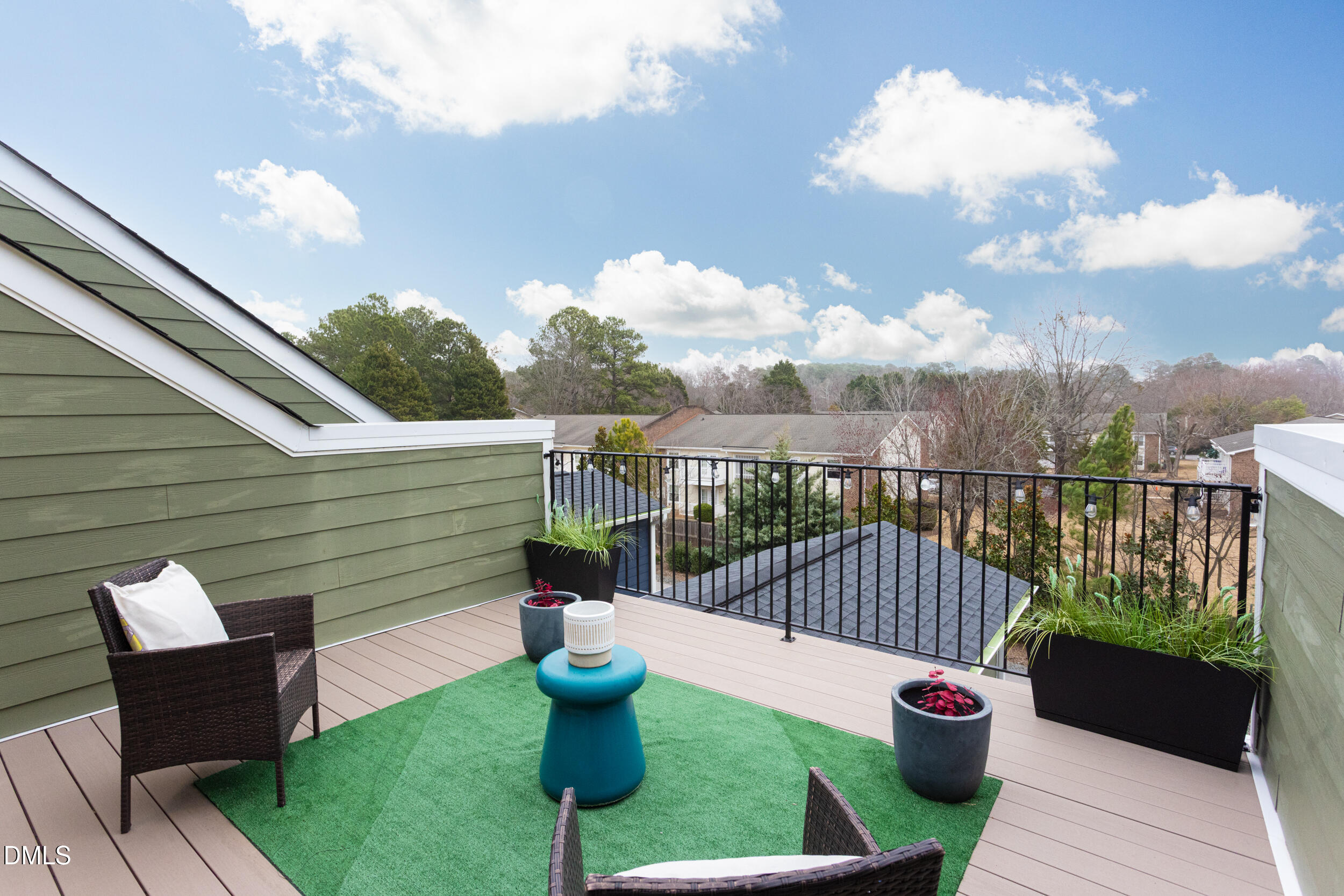 469 Rally Point Place Wake Forest, NC 27587 - Photo 31 of 37 a view of a deck with two chair couches and wooden fence