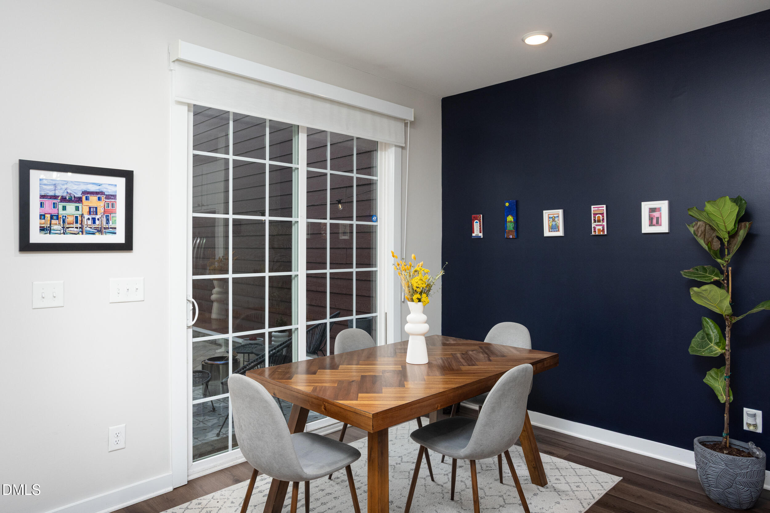 469 Rally Point Place Wake Forest, NC 27587 - Photo 10 of 37 a view of a dining room with furniture and wooden floor