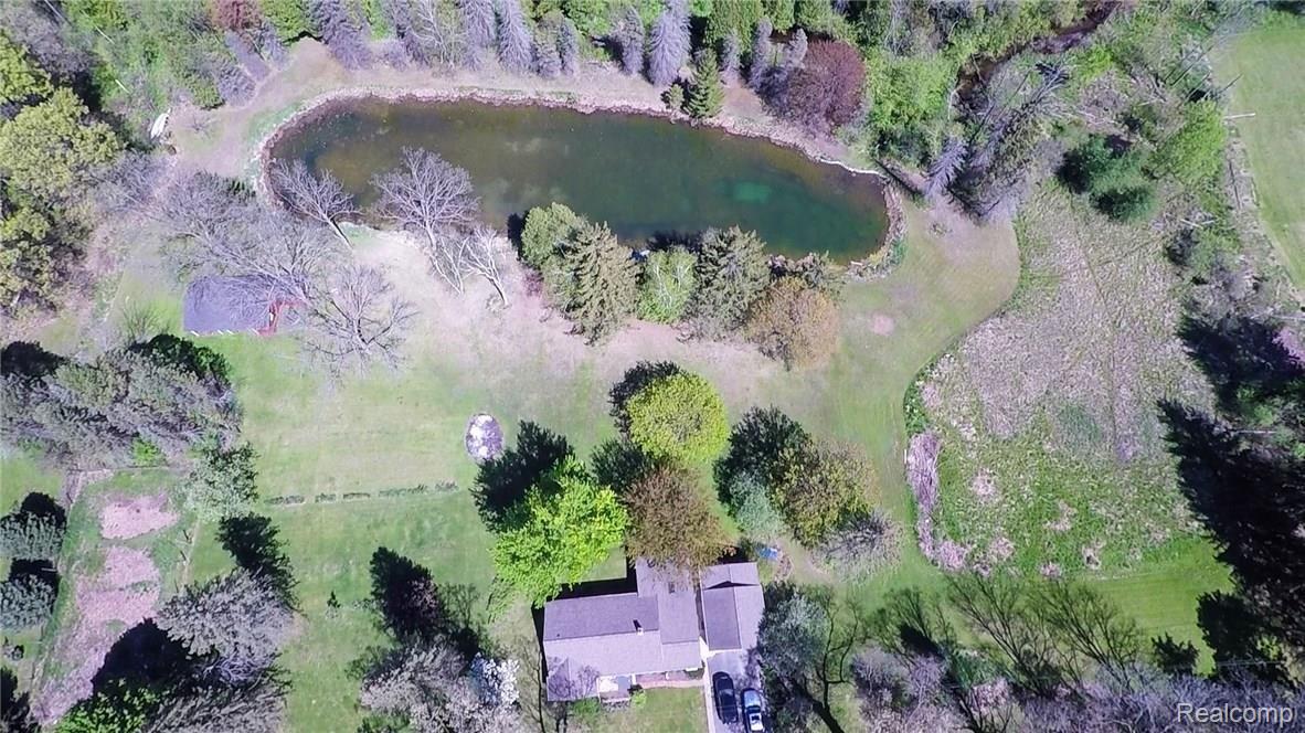 8254 Perry Lake Road Clarkston, MI 48348 - Photo 2 of 33 LARGE POND, SURROUNDED BY GRASSY FLAT LAND & TREES