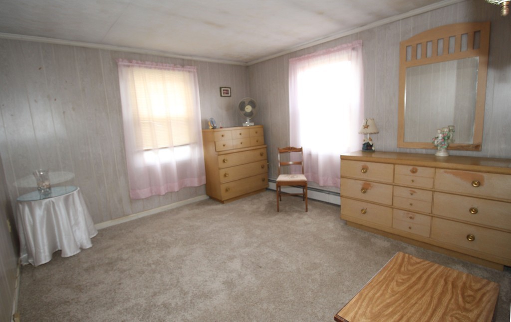 430 Newport Road Hull, MA 02045 - Photo 8 of 10 a room with furniture and window