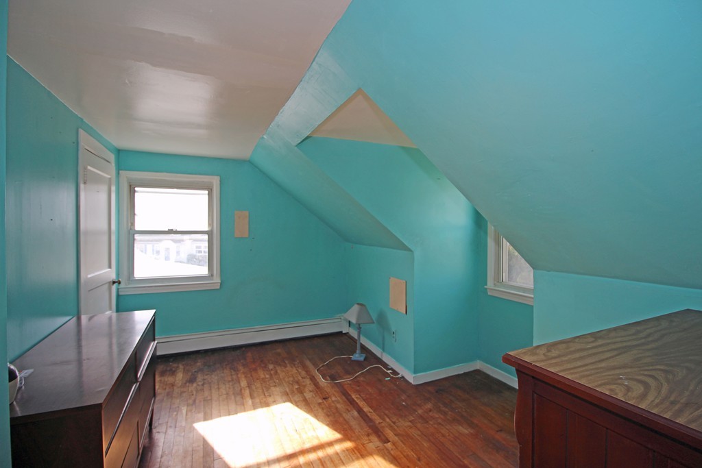 430 Newport Road Hull, MA 02045 - Photo 9 of 10 a room with window and wooden floor