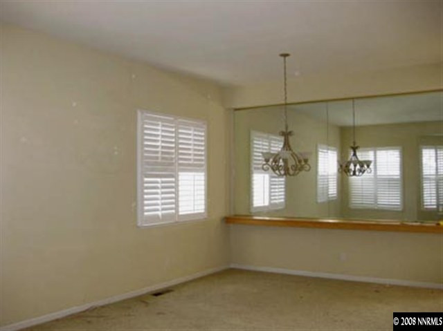 4542 Goodwin Road Sparks, NV 89436 - Photo 4 of 9 a view of a room that has a window in it