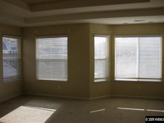 4542 Goodwin Road Sparks, NV 89436 - Photo 7 of 9 a view of an empty room with a window