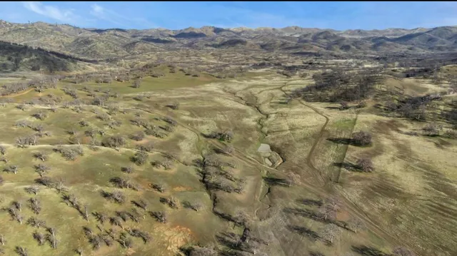 a view of a lake and mountain in the back
