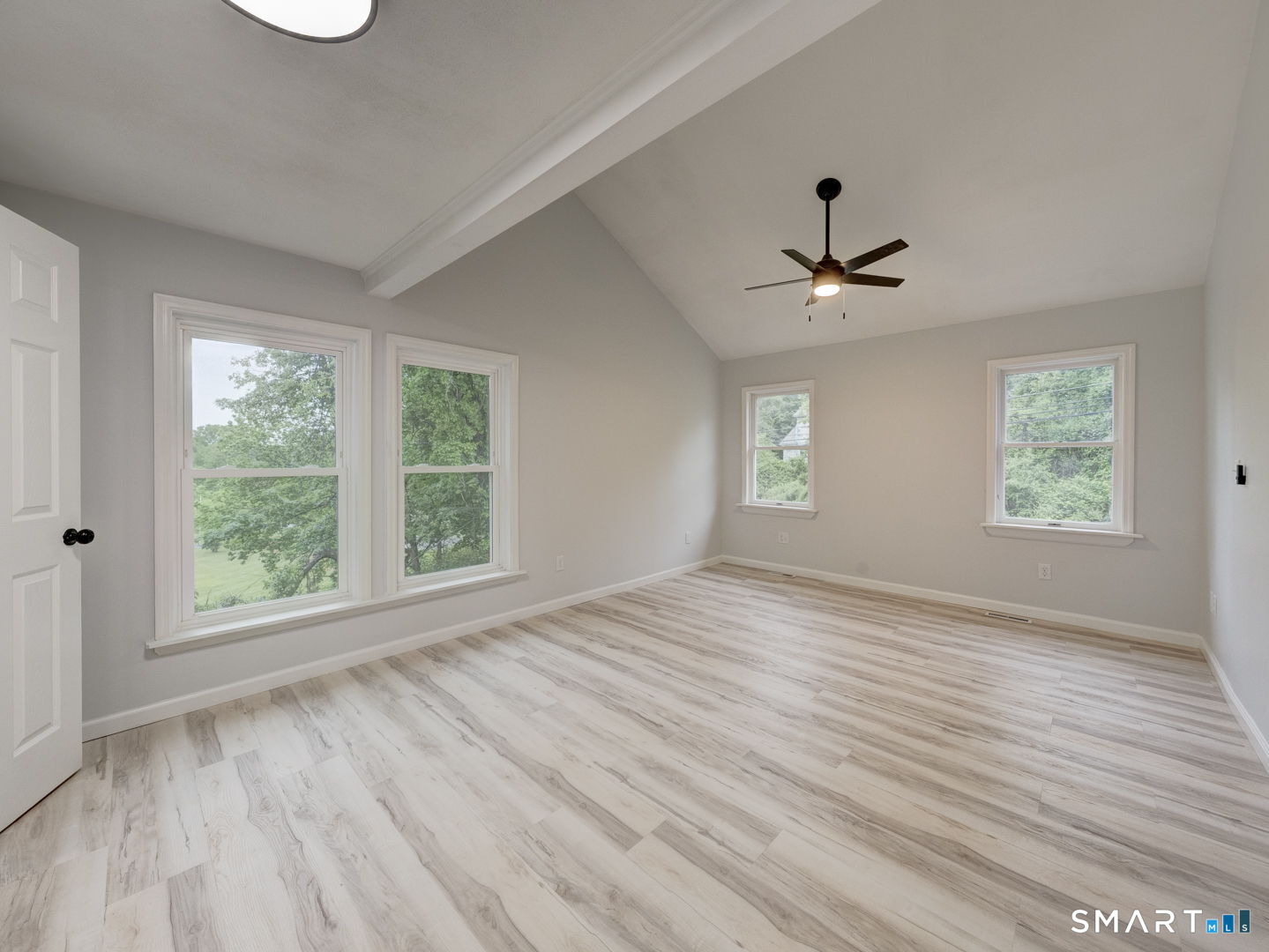 11 Cheshire Road Prospect, CT 06712 - Photo 12 of 38 a view of an empty room with a window and wooden floor