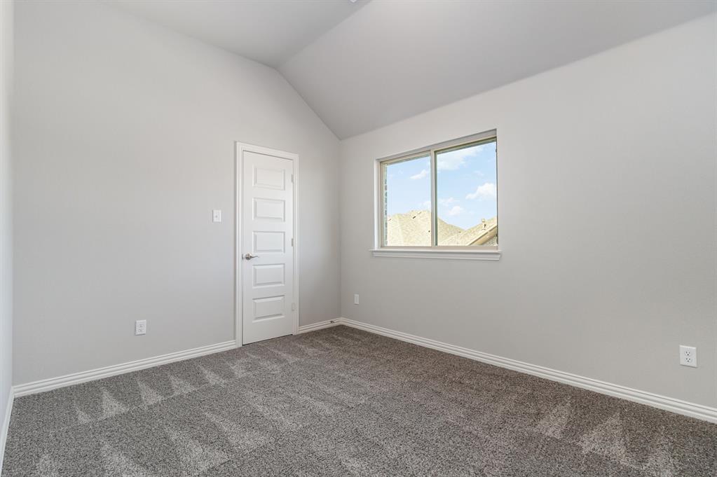 232 Cisco Trail Forney, TX 75126 - Photo 13 of 27 an empty room with windows