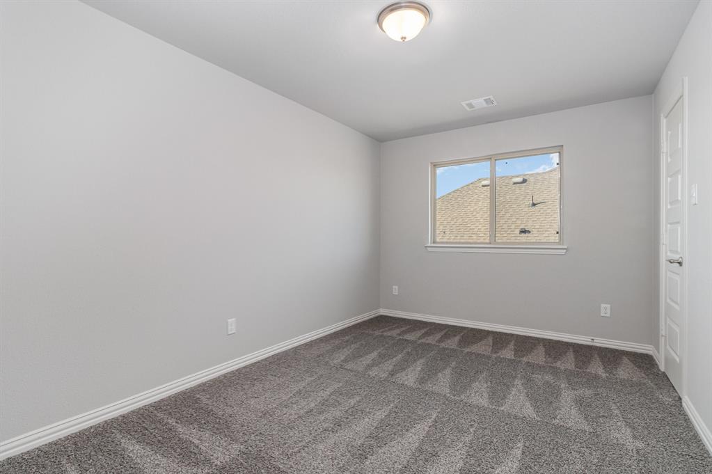 232 Cisco Trail Forney, TX 75126 - Photo 14 of 27 an empty room with windows