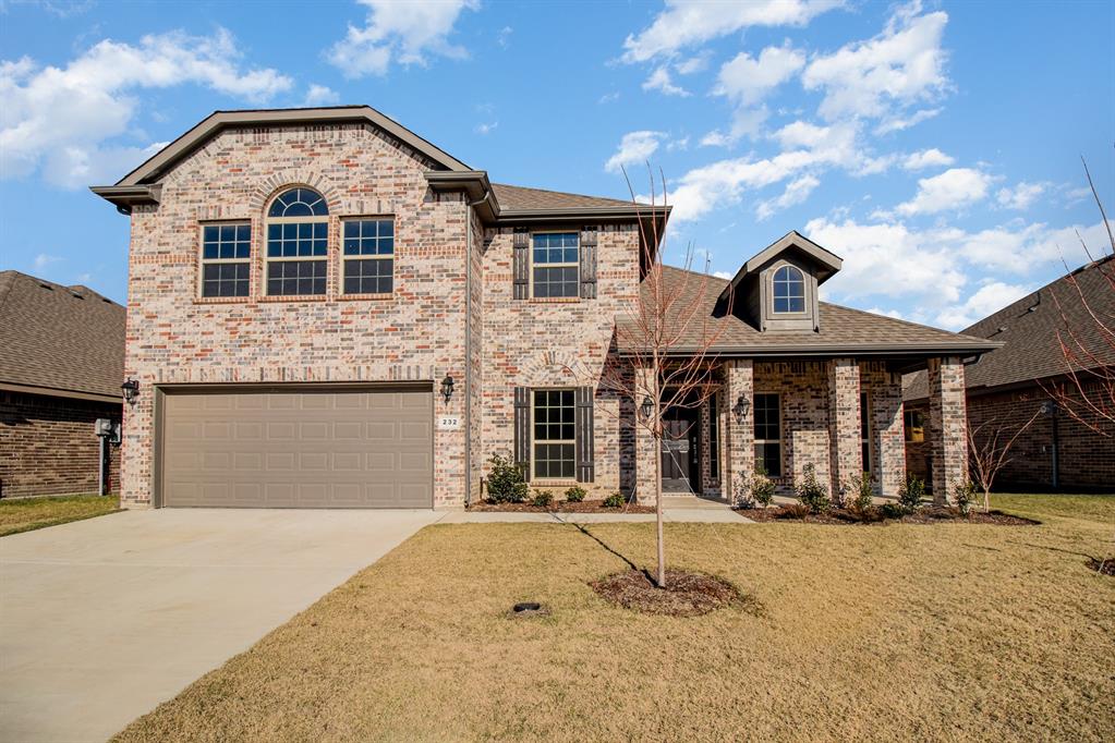 232 Cisco Trail Forney, TX 75126 - Photo 2 of 27 a front view of a house with a yard