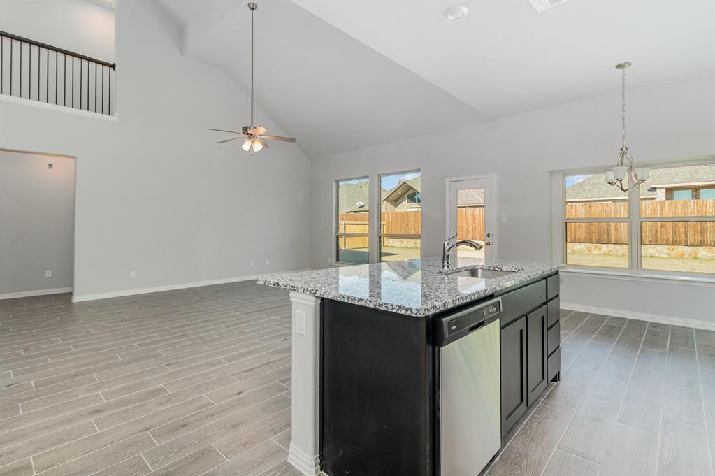 232 Cisco Trail Forney, TX 75126 - Photo 27 of 27 wooden floor in an empty room with a window
