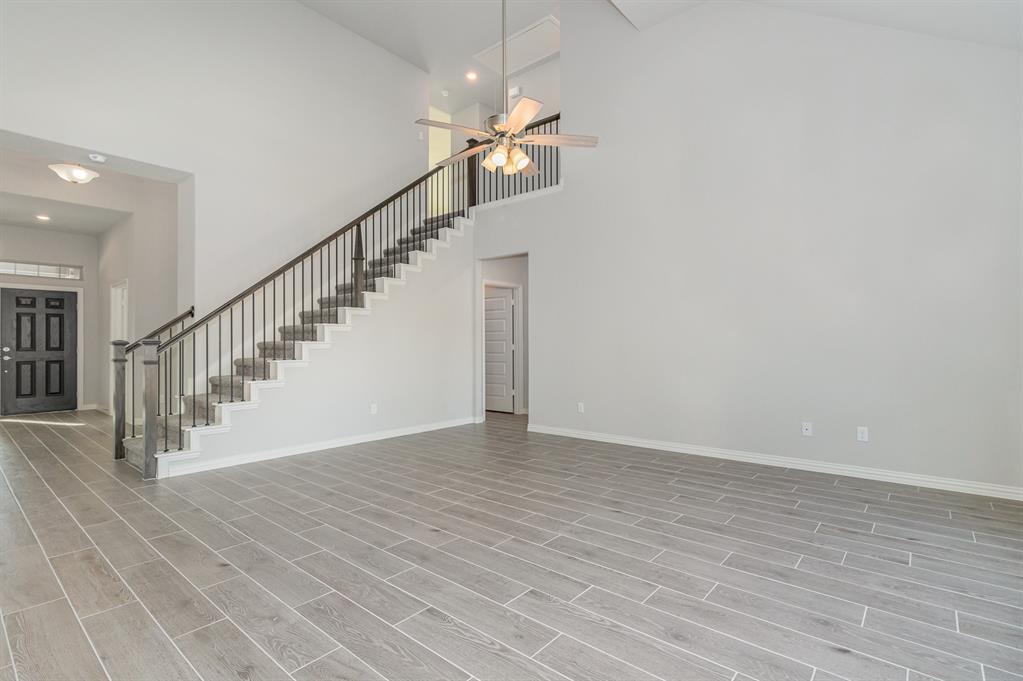 232 Cisco Trail Forney, TX 75126 - Photo 5 of 27 a view of entryway and hall with wooden floor