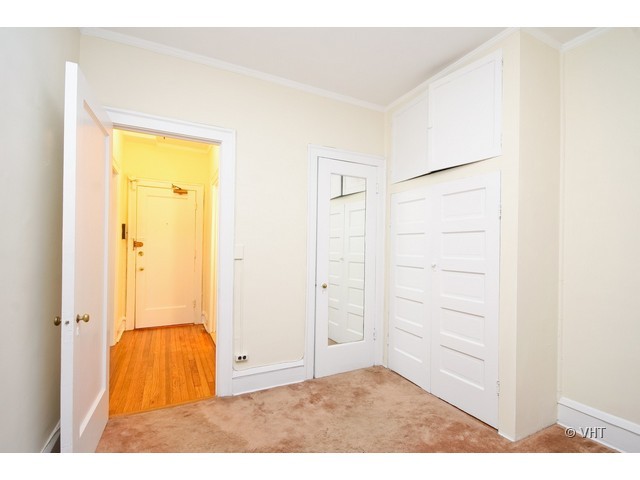 400 West Deming Place, Unit 6G Chicago, IL 60614 - Photo 10 of 11 a view of room with wooden floor and windows