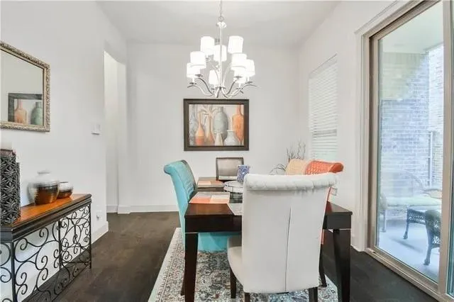 a living room with furniture fireplace and window