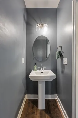 a bathroom with a sink and mirror