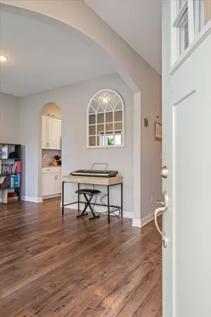 a view of a livingroom with furniture and wooden floor