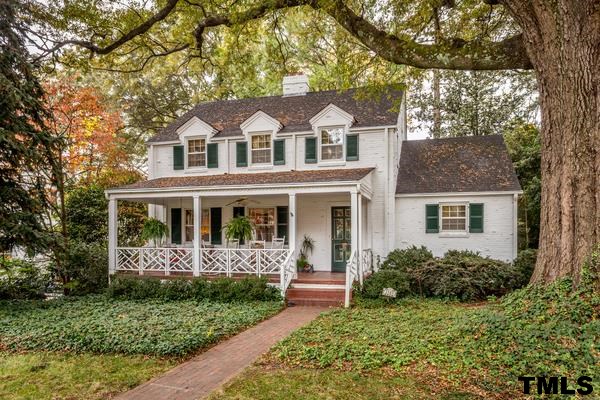 1103 Harvey Street Raleigh, NC 27608 - Photo 1 of 25 a front view of a house with a garden