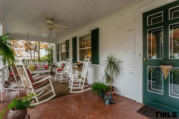 1103 Harvey Street Raleigh, NC 27608 - Photo 3 of 25 a view of a chairs and table in a patio