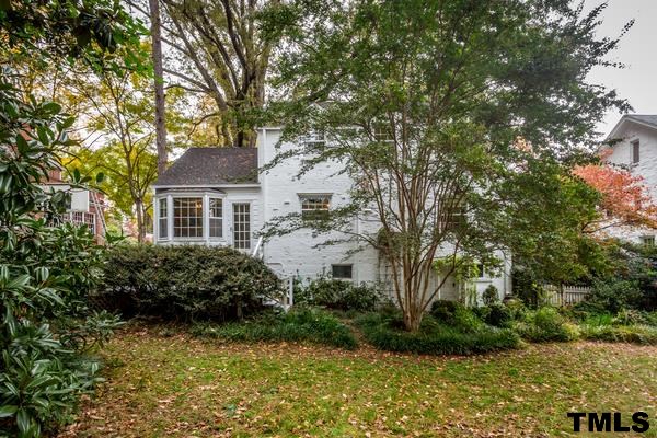 1103 Harvey Street Raleigh, NC 27608 - Photo 21 of 25 a front view of a house with garden