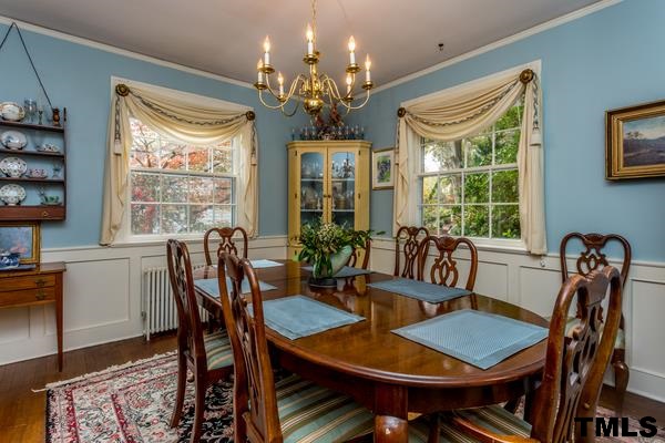 1103 Harvey Street Raleigh, NC 27608 - Photo 10 of 25 a view of a dining room with furniture window and outside view
