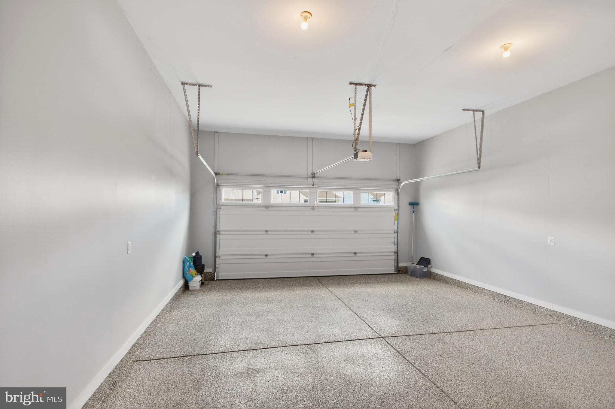 21144 Conti Street Lewes, DE 19958 - Photo 66 of 81 Garage with Epoxy Floor