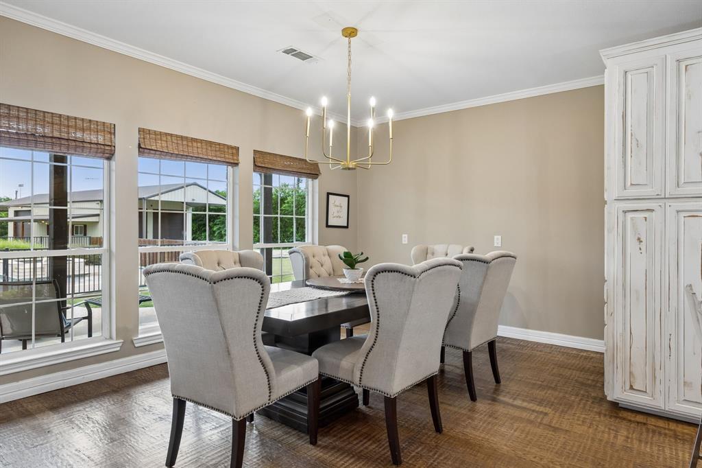 1700 Rock Ridge Road Lucas, TX 75002 - Photo 12 of 37 Lovely breakfast/dining area with a little planning desk tucked behind the cabinets.