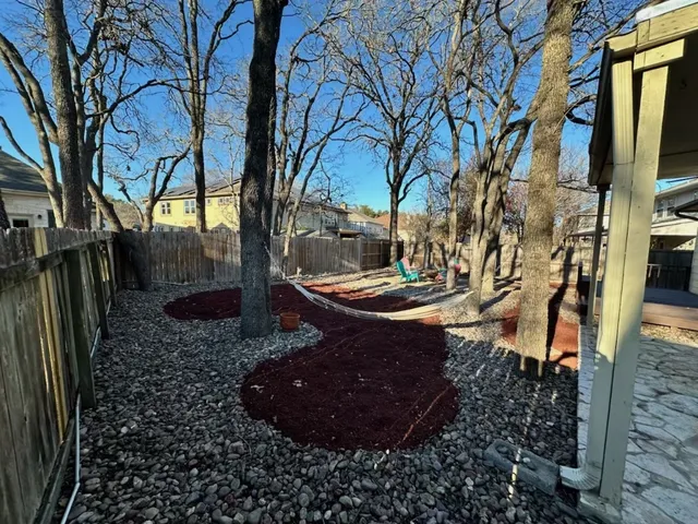 a view of a backyard of the house