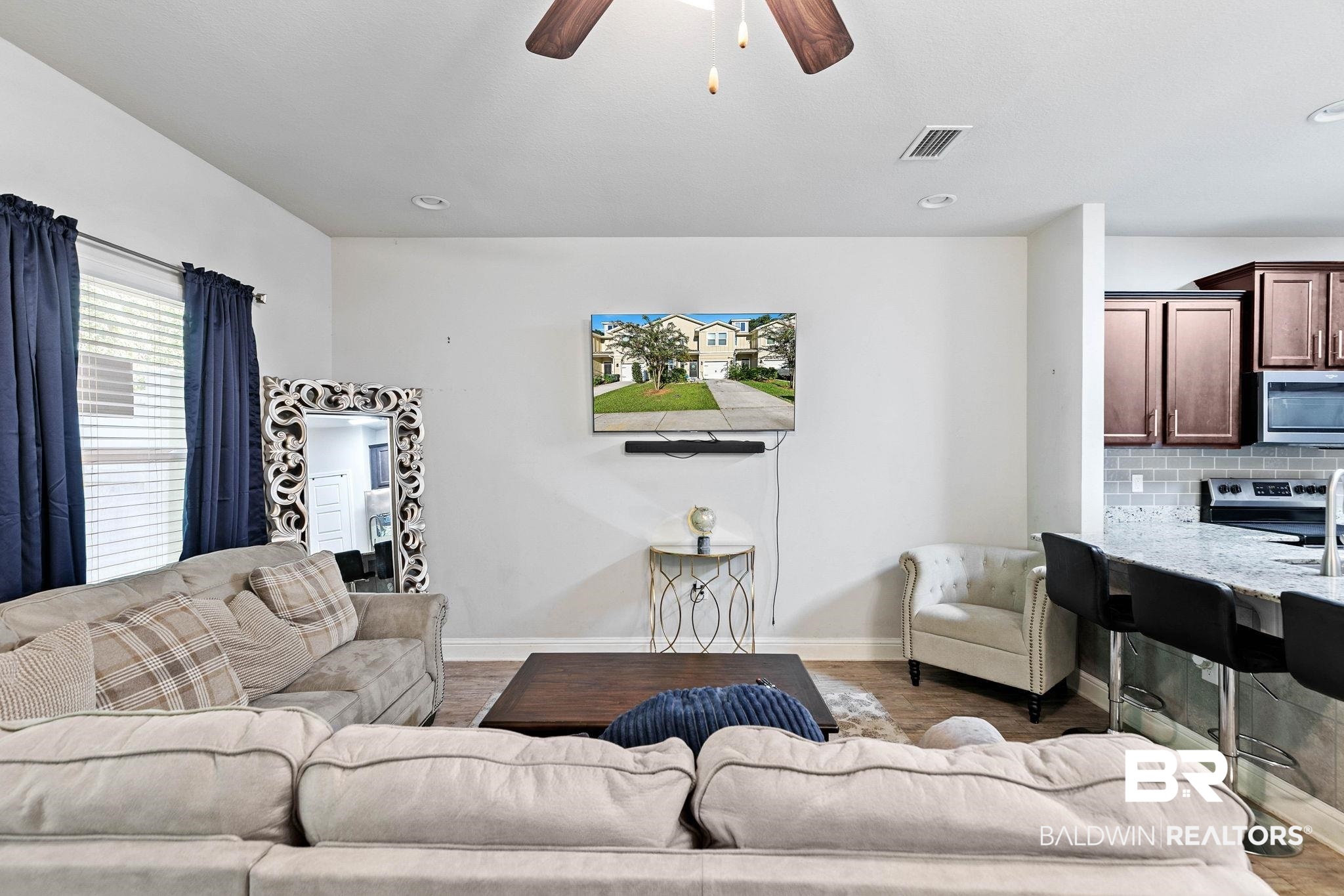 25806 Pollard Road, Unit 24 Daphne, AL 36526 - Photo 6 of 33 Living room with ceiling fan, recessed lighting, and wood finished floors