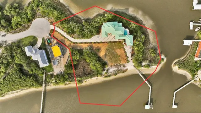 a living room filled with furniture and a large window