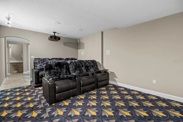 a view of a balcony with a floor to ceiling window next to a building