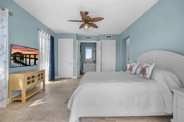 an aerial view of a house with a lake view