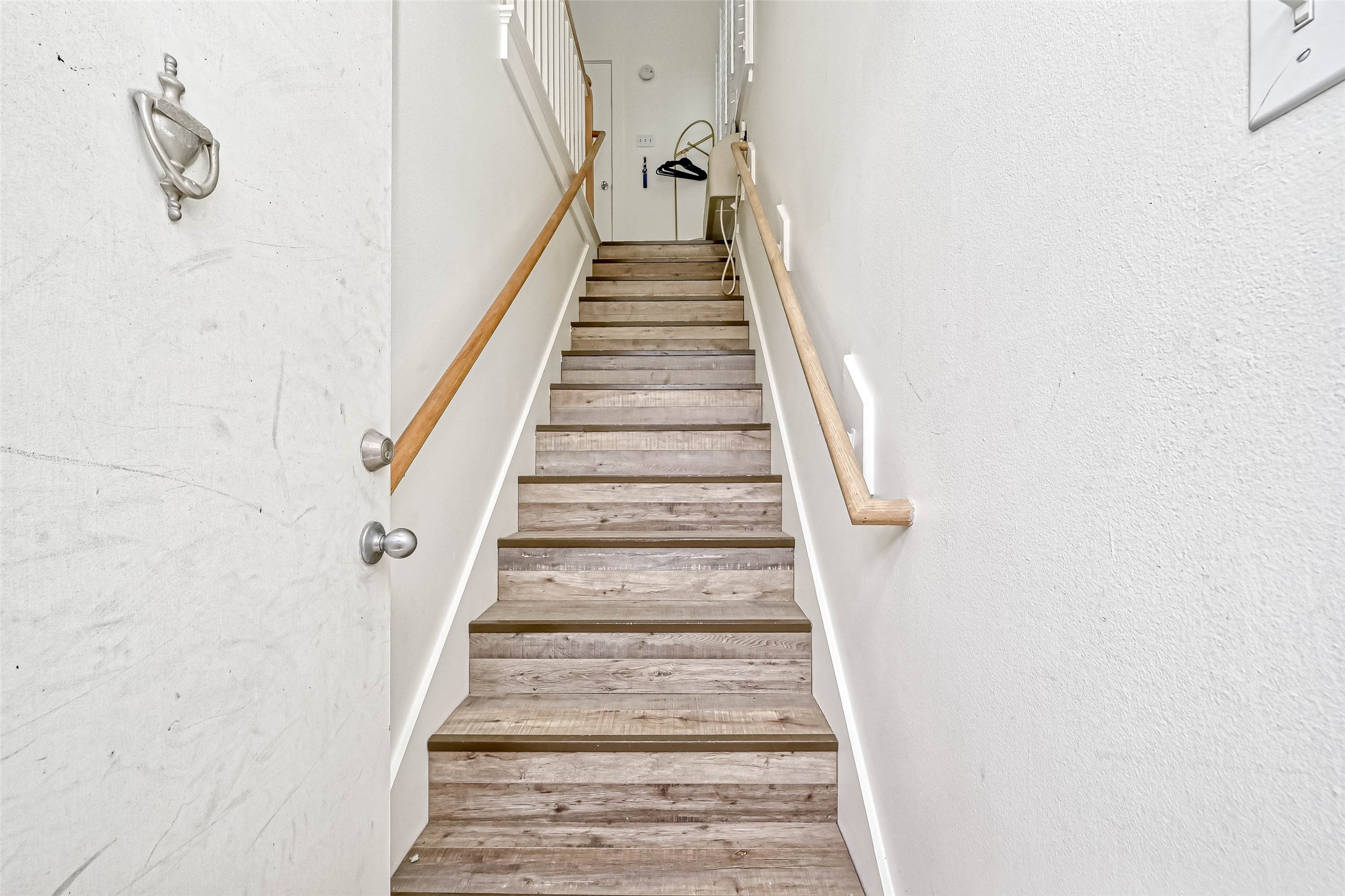 2112 Harold Street Houston, TX 77098 - Photo 3 of 16 The front door entrance to the home has one flight of stairs to get to the studio garage apartment.