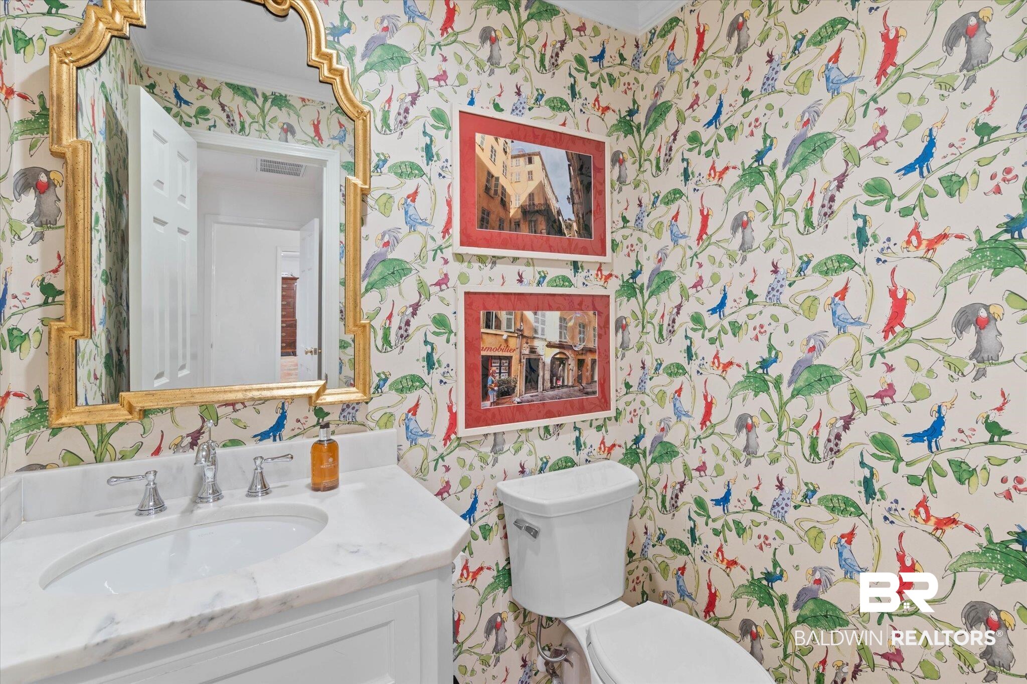 3612 Linden Lane Mobile, AL 36608 - Photo 12 of 42 Half bathroom with wallpapered walls and vanity