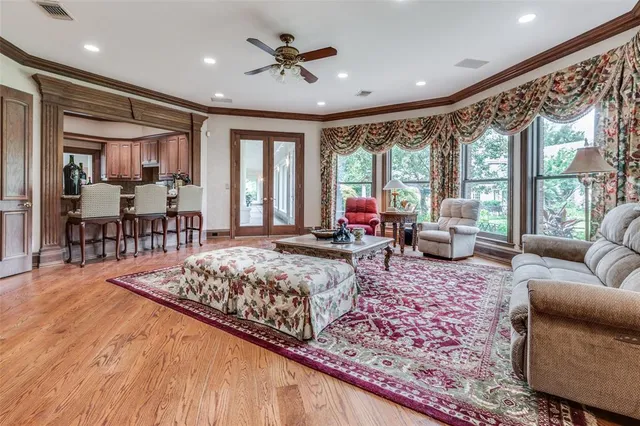 a living room with furniture and a rug