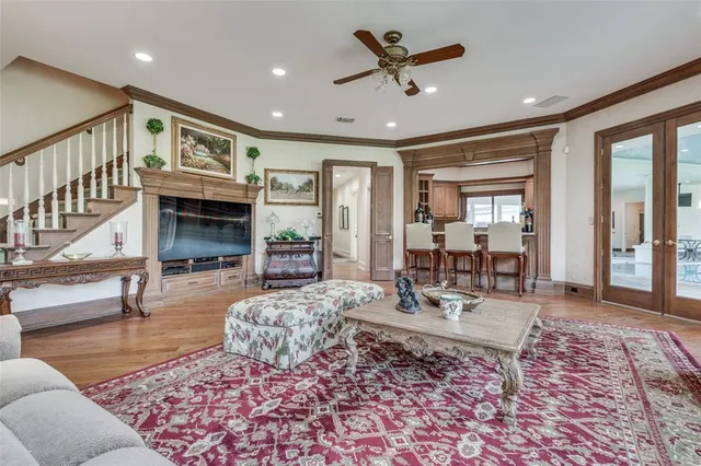a kitchen with stainless steel appliances granite countertop a sink and cabinets