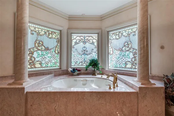 a view of an empty room with empty shelves